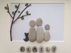 the family is made out of rocks and pebbles