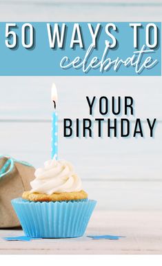 a cupcake with a lit candle on it and the words 50 ways to celebrate your birthday