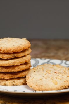 a stack of cookies sitting on top of a white plate