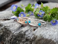 The Kaia is a knockout!  This chic cowgirl staple features a bright pop of color with a pair of vibrant round turquoise on either side of a hand-engraved middle section. The wide part of the band is a dainty 5mm, perfect to show off the hand-engraving and for subtle sparkle. The band itself is cute too, in a sweet rope style.  Available in both 10K rose and 10K white gold. Made with love in the rural oasis of Eminence, Missouri, this little beauty is perfect for the modern cowgirl who wants a subtle statement piece in her collection.  We make each piece by hand, one at a time, for every order. Because of this, your final piece may vary slightly from the picture and the engraving style may be adjusted slightly to fit your ring size or customizations. Please allow at least 5 to 6 weeks for s Eminence Missouri, Cowgirl Ring, Chic Cowgirl, Rodeo Jewelry, Western Rings, Cowgirl Wedding, Modern Cowgirl, Bright Pop, Rope Ring