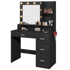 a black vanity with lights on it