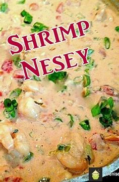 shrimp and veggie soup in a pot with the words shrimp nessey