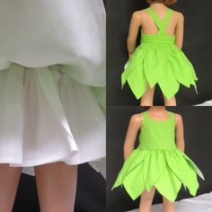 the doll is wearing a green dress and has her legs spread out to show off