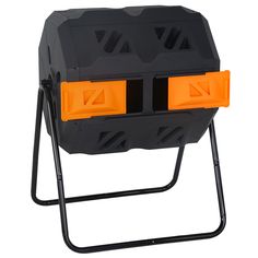 an orange and black plastic container on a metal stand with two yellow bins in it