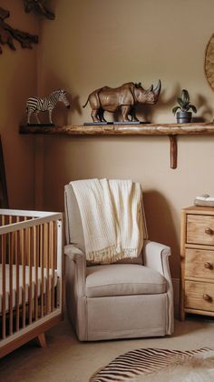 a baby's room with stuffed animals on the shelves