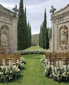 an outdoor ceremony set up with chairs and flowers