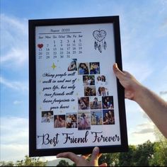 a person holding up a framed photo with pictures on it that says best friend forever