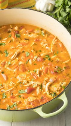 a large pot filled with soup on top of a table