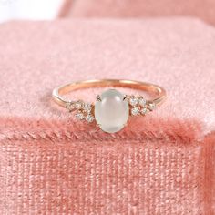 Authentic Icy Jadeite Cluster Diamonds Engagement Ring, Grade A Oval Cabochon Jadeite Dainty Promise Ring, 4 Prong Solitaire Wedding Rings ✧･ﾟ: *✧･ﾟ:* Welcome to Charles Davin Jewelry*:･ﾟ･ﾟ✧ ✶Material: 10K/ 14K/ 18K ✶Main Stone: Type A Burmese Jadeite Jade; Approx. 5x6mm ✶Side Stone: Natural Diamonds; Approx. 0.08ct ✶Color: F-G ✶Clarity: SI1 ✶Width of band: 1.5mm ✶Thickness of band: 1.2mm PRODUCTION TIME My team of jewelry artisans and I are ecstatic and cannot wait to share our passion, joy and Jade Engagement Ring, Dainty Promise Ring, Cute Engagement Rings, Diamond Cluster Engagement Ring, Wedding Rings Solitaire, Etsy Wedding Rings, Jade Ring, Engagement Anniversary, Oval Cabochon