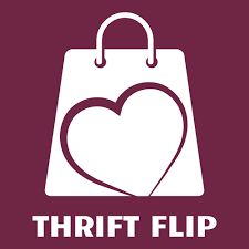 a white shopping bag with a heart on it and the words thrift flip written below