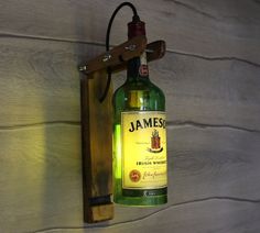 a bottle of jameson is hanging on the wall