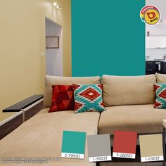 a living room filled with lots of furniture and colorful pillows on top of the couch