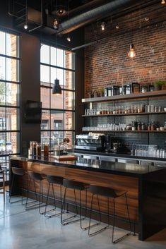 an empty restaurant with brick walls and lots of counter space in front of the bar