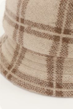 A Toast to Vintage Charm: Plaid Wool Flapper Hat Wrap yourself in the elegance of yesteryear with our Vintage Winter Wool Plaid Flapper Hat. This charming accessory, made from 100% premium sheep's wool, offers a luxurious yet comfortable fit for the discerning woman. Its soft, skin-friendly material is perfect for daily wear, while the distinctive plaid pattern in neutral tones provides versatility to any ensemble. Tailored to fit most head sizes (56-58CM), our flapper hat combines the grace of Flapper Era, Flapper Hat, Vintage Winter, Modern Wardrobe, Soft Skin, The Grace, Chic Accessories, Modern Life, Wool Plaid