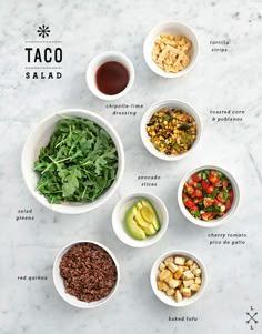 the ingredients for taco salad laid out in small bowls on a marble countertop