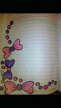 an open notebook with bows and beads on it