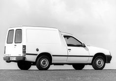 a white van parked on the side of a road