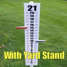 a thermometer with yard stand on grass