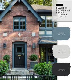 the exterior of a brick house with black and white paint colors in front of it