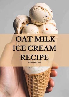 a hand holding an ice cream cone with the words oat milk ice cream recipe