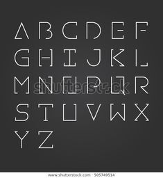 the english alphabet is written in white chalk on a black background, and it appears to be