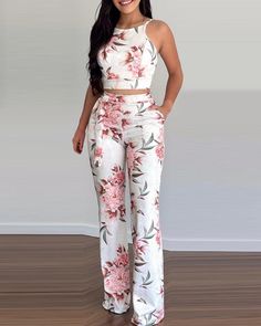 Style:SexyType:Pants SetsMaterial:PolyesterNeckline:Round NeckSleeve Style:SleevelessLength:LongPattern Type:FloralFit Type:RegularWith Belt:YesOccasion:VacationPackage Include:Pants Set S: bust:31.5(inch); hips:34.6(inch); top length:13.0(inch); bottom length:42.5(inch); bottom waist:26.0(inch); M: bust:33.1(inch); hips:36.2(inch); top length:13.4(inch); bottom length:42.9(inch); bottom waist:27.6(inch); L: bust:34.6(inch); hips:37.8(inch); top length:13.8(inch); bottom length:43.3(inch); botto Sleeveless 2-piece Set For Spring, Spring Two-piece Sleeveless Set, Spring High-waist Two-piece Sets, Spring High-waisted Two-piece Jumpsuits And Rompers, Spring High Waist Two-piece Sets, Spring High Waist Two-piece Jumpsuits And Rompers, Fitted High-waist Two-piece Set, Fitted High Waist Two-piece Set, Spring High Waist Two-piece Pant Set