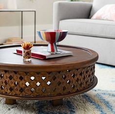 a living room with a coffee table and couch