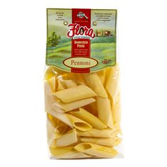 a bag of penna pasta sitting on top of a white table