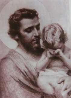 a drawing of jesus holding a baby in his arms and looking at the viewer's eye