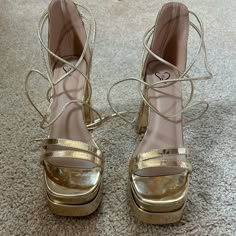 Gold Lace Up Platform Windsor Heels Size 7 Never Worn Before!!!! In Perfect Condition Homecoming Dress Gold, Prom Gold Heels, Prom Shoes Gold, Gold Heels For Dance, Gold Prom Heels, Gold Platform Heels For Prom, Gold Synthetic Heels, Gold Lace-up Heels For Evening