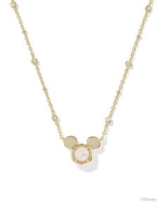 Experience the feeling of everyday magic with the Disney | Kendra Scott Gold Mickey Mouse Short Pendant Necklace in Freshwater Cultured Pearl. A signature KS pendant topped with Disney Mickey Mouse ears gets an extra dose of dazzle with a crystal-studded satellite chain. Timeless, iconic, and full of joy, this precious pendant will sprinkle a bit of extraordinary into your everyday looks. Metal 14k Yellow Gold Over Brass Material Freshwater Cultured Pearl Closure Lobster Clasp W/ Single Adjustab Gold Mickey Mouse, Mickey Mouse Necklace, 17th Birthday Gifts, Short Pendant Necklace, Mickey Mouse Shorts, Everyday Magic, Pandora Disney, Kendra Scott Necklace, Bar Jewelry