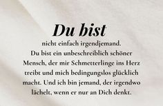 a poem written in german on a white sheet with black writing and an image of the words du bist