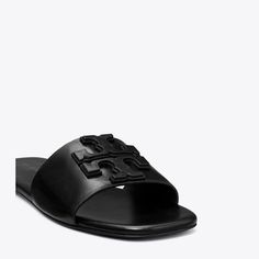 Chic and minimal, the Ines Slide is crafted in soft leather with a comfortable cushioned footbed. A double-stacked leather logo adds subtle dimension to the effortless and elevated sandal.Crafted in partnership with a Leather Working Group-certified tannery, supporting high standards in leather manufacturing and chemical management. High Standards, Footwear Design Women, Designer Sandals, Wallet Accessories, Handbag Shoes, Leather Logo, New Handbags, Leather Working, Soft Leather