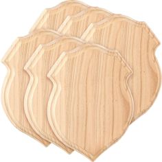 three wooden coasters with wavy lines on each side, set against a white background