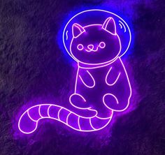 a neon cat sitting on the ground