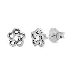 the silver knot stud earrings are shown on a white background