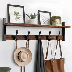 This wall-mounted coat rack with shelves frees up your floor spacedecorates your wallsand maximizes your living area at the same timeusing it as an entrance coat hanger wall hanger with all your carry-on essentials at your fingertipskeysbagshatsand moreNot only will it keep your space organizedbut you won't have to look around for things when you go out17 Stories17 Stories 29Rustic Coat Rack Wall Mount wShelfWall Hooks wShelfEntryway Floating Shelf w5 Metal HooksCoat Hangers For Entryway8H X 29 Coat Key Rack Entryway, Entryway Hat Rack, Shelf With Hooks Underneath, Floating Shelves In Entryway, New Home Must Haves Products, Bench And Hooks Entryway, Coatracks Entryway Wall, Hanging Backpacks On Wall, Entryway Wall Hook Ideas