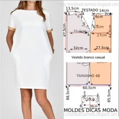 a woman is wearing a white dress and has her measurements printed on the side, while she