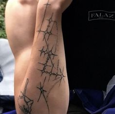 a man's arm with barbed wire on it