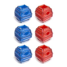 four red, white and blue plastic objects on a white surface