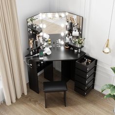 a black vanity with lights on it and a stool in front of the mirror that is open