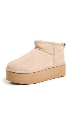 PRICES MAY VARY. Suede upper 17mm UGGplush wool lining 17mm UGGplush wool insole Sugarcane EVA EVA midsole Ugg Platform Ultra Mini, Platform Ugg Mini, Trendy Fall Shoes For Women, Ugg Boots Aesthetic, Uggs Mini Boots, Platform Uggs, Ugg Classic Ultra Mini, Nike Shoes Women Fashion, Pretty Shoes Sneakers