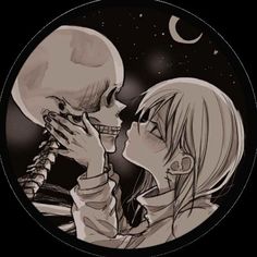 two people kissing each other in front of the moon