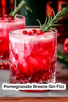 pomegranate breezee gin fizz is garnished with fresh rosemary