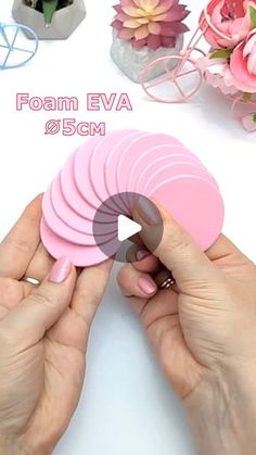 a person is holding several pieces of pink paper in their hands, with the text foam eva