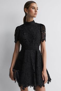 You'll be collecting notes from secret admirers right and left when you don the Samira Lace Mini Dress! Crafted from delicate lace for a sculptural fit, this mini dress is designed to flatter with a fitted bodice and waist accentuating the voluminous A-line mini skirt. With the high neckline and short sleeves, it is a perfect pick for garden parties, weddings, and cocktail events. Hidden back zipper/clasp. Lace, Cotton, Polyester. Lined. Runs true to size. Hand Wash Cold. Do Not Bleach. Line Dry. Iron Low Heat. Origin China. Size Chart (Unit cm) Size Bust Waist Hip Length S 88 70 120 101 M 92 74 124 102 L 96 78 128 103 XL 100 82 132 104 Error Margin: 1-3 cm ** Color may vary due to lighting on images. Leo Lin, A Line Mini Skirt, Cardigan Sweater Jacket, Garden Parties, Gothic Dress, Crop Top Blouse, Boho Maxi Dress, Cutout Dress, Lace Mini Dress