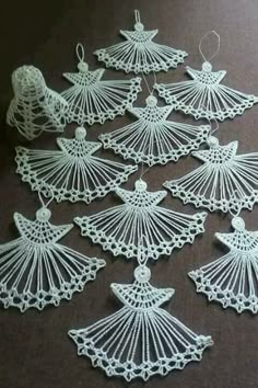 several white doily pieces on a table