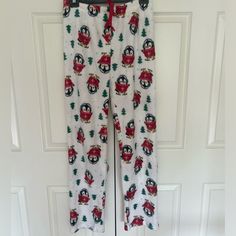 Super Soft, White Pajama Pants With Winter Penguins Never Worn, Perfect Condition White Cotton Home Bottoms, White Cotton Christmas Sleepwear, Casual White Holiday Sleepwear, Christmas Holiday Long Pants Sleepwear, Christmas Holiday Sleepwear With Long Pants, White Christmas Pajama Party Sleepwear, White Christmas Sleepwear For Pajama Party, White Bottoms For Christmas Holiday, Holiday White Sleepwear For Pajama Party