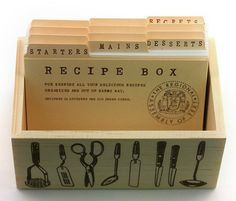 a recipe box with several different types of utensils in it