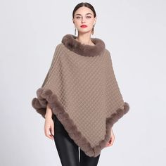 Elevate your wardrobe with our exquisite Fashion Stripes Faux Fur Pullover Cape Coat. Perfect for any occasion, this knit poncho wrap is a luxurious and versatile addition to your closet. From the faux fur trimmed neckline to the stylish hemline, this one size fits all poncho is designed to fit most small to large sizes, making it the perfect fashion accessory for the modern woman on the go. Available in multiple colors, it's the ultimate blend of comfort and sophistication. (cover photo shown i Fur Trimmed Cape, Turtleneck Poncho, Gorgeous Boots, Poncho Wrap, Winter Mode, Poncho Style, Estilo Chic, Sweater Collection, Cape Coat